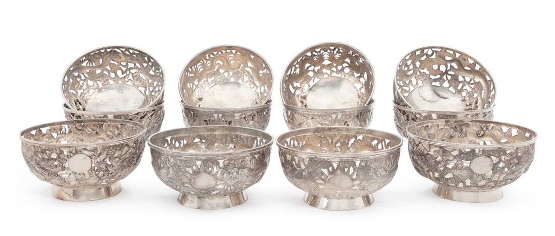 A SET OF TWELVE CHINESE EXPORT SILVER PIERCED BOWLS LATE 19TH/ EARLY 20TH CENTURY (1 of 2)