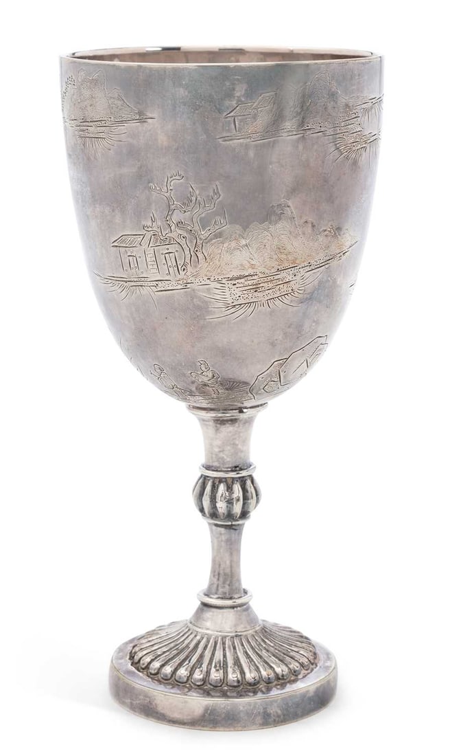 A CHINESE EXPORT SILVER GOBLET LATE 19TH/ EARLY 20TH CENTURY: the ovoid bowl decorated with landscape scenes, with knopped stem and demi-fluted spreading foot. 16cm high, 6.2 troy ounces Good condition overall, wear commensurate with age and use. Surface scratch