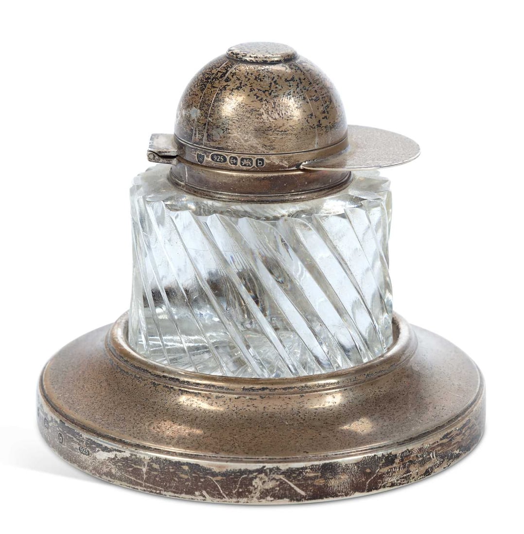 AN ELIZABETH II SILVER-MOUNTED NOVELTY GLASS INKWELL ON STAND (1 of 2)