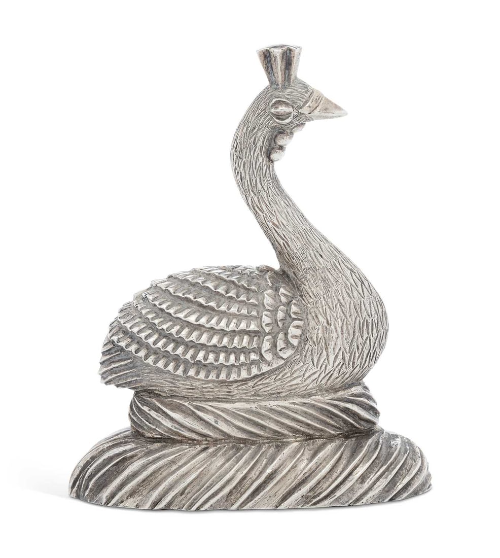 A ELIZABETH II CAST SILVER MODEL OF A PEAHEN: by Denis Lacy-Hulbert, Sheffield 1981, naturalistically modelled seated upon a nest, weighted. 10cm high