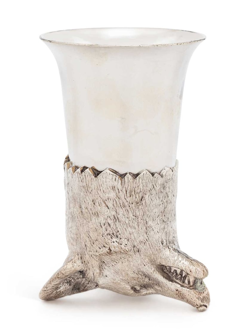 AN ELIZABETH II SILVER STIRRUP CUP: by Royal Irish Silver Co., Sheffield 1972, modelled as a fox's head with textured fur, with plain bell-shaped cup. 12cm high, 10.6 troy ounces Good condition overall, some minor wear commensurate with