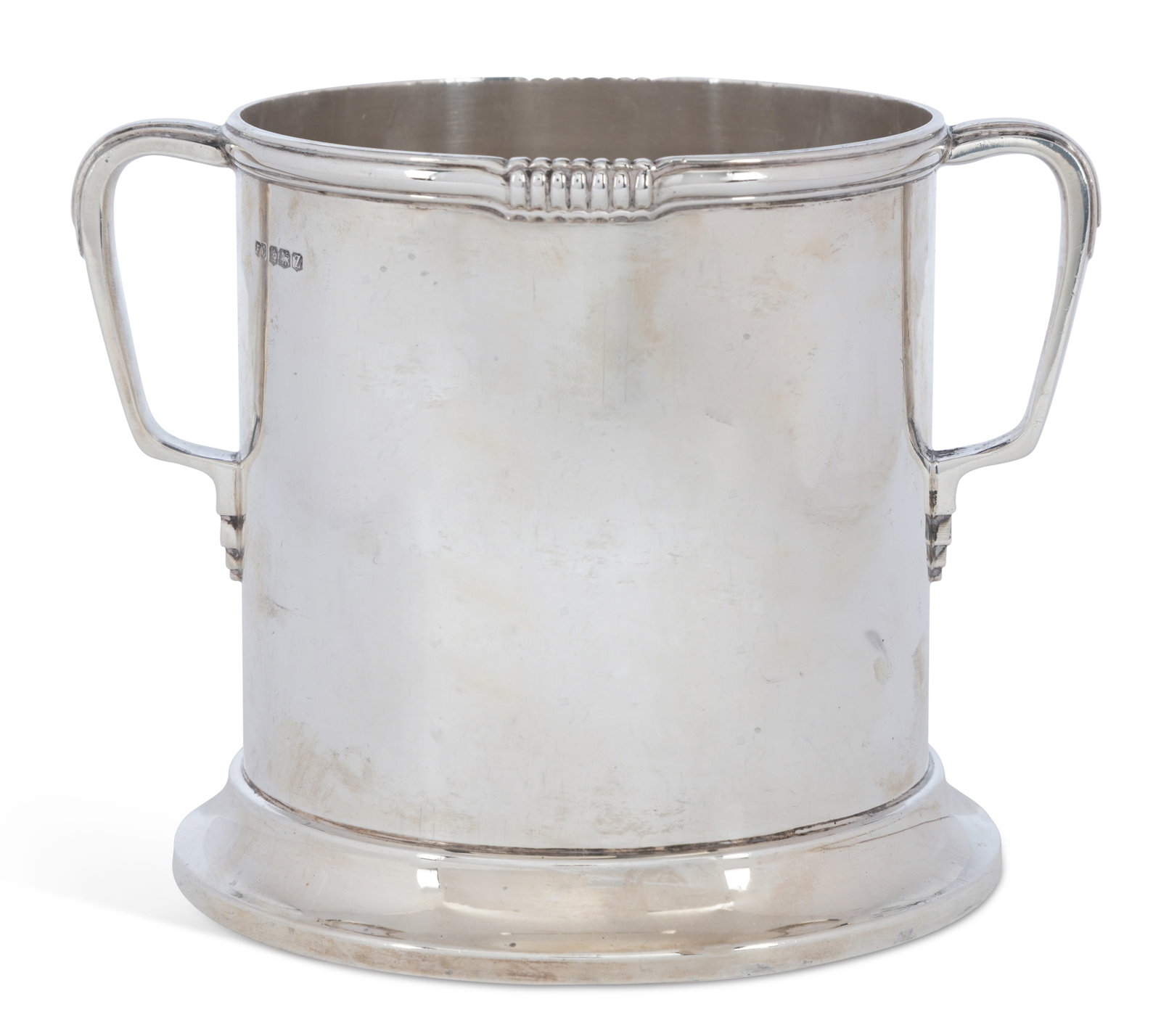 A GEORGE VI SILVER ART DECO SYPHON STAND: by Frank Cobb & Co Ltd, Sheffield 1941, of cylindrical form, with two C-shaped side handles and a spreading base, ribbed embellishment on the rim. 14cm high, 22.7 troy ounces