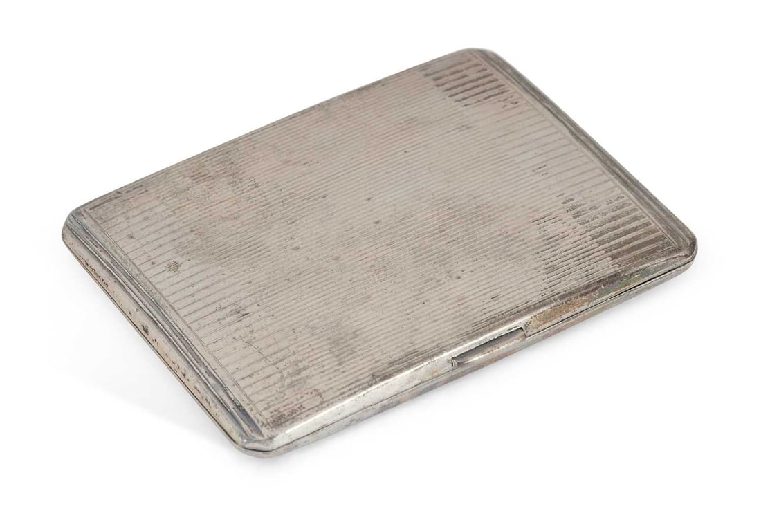 A GEORGE VI SILVER CIGARETTE CASE: by E J Trevitt & Sons, Birmingham 1941, of rectangular form, decorated with reeded pattern, the interior gilded and engraved R.G.G. / FROM P.M.E.S / 13-10-53. 11.5cm high, 5.9 troy ounces