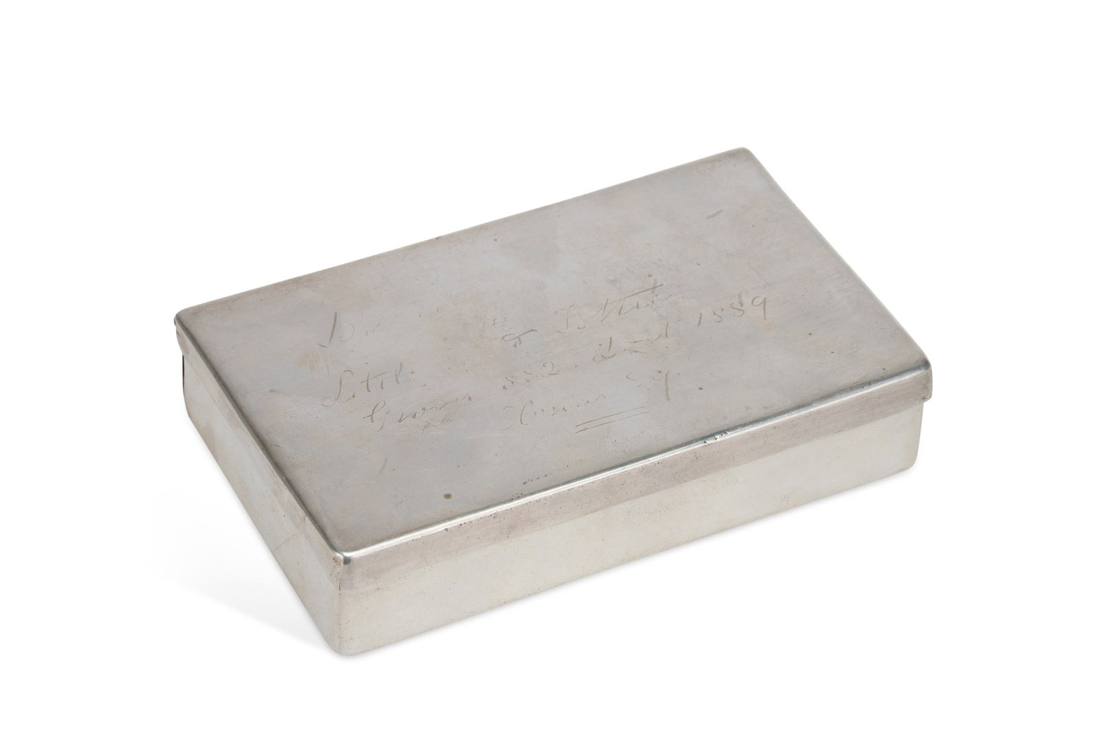 A VICTORIAN SILVER SANDWICH BOX: by Wright & Davies (William Thomas Wright & Frederick Davies), London 1877, of plain rectangular form with hinged cover, additionally stamped Thornhill, 144 Bond St., London. 12.5cm by 7.5cm by