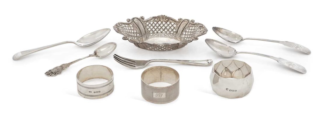 A GROUP OF GEORGE IV AND LATER SILVER: comprising a pair of George IV teaspoons by Thomas Wheatley, Newcastle 1824; together with three napkin rings; a souvenir spoon; a basket; and a Christening set. (9) Basket 12.5cm wide, 6 troy ounces 