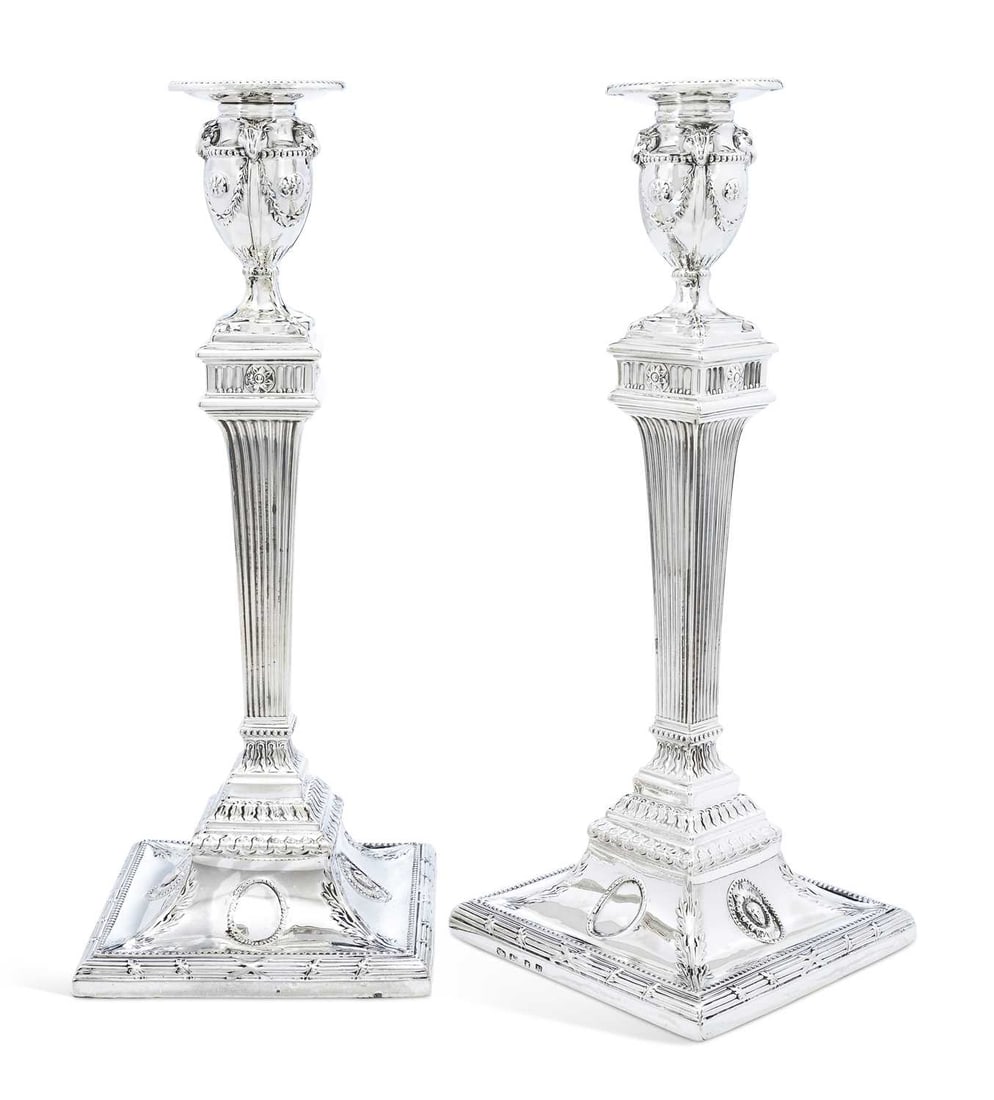 A PAIR OF GEORGE III SILVER CANDLESTICKS (1 of 2)