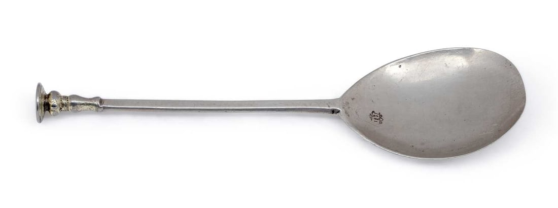 AN EARLY SILVER SEAL TOP SPOON: maker's mark RL, the seal top engraved PI TC 1658. 16cm long, 1 troy ounces