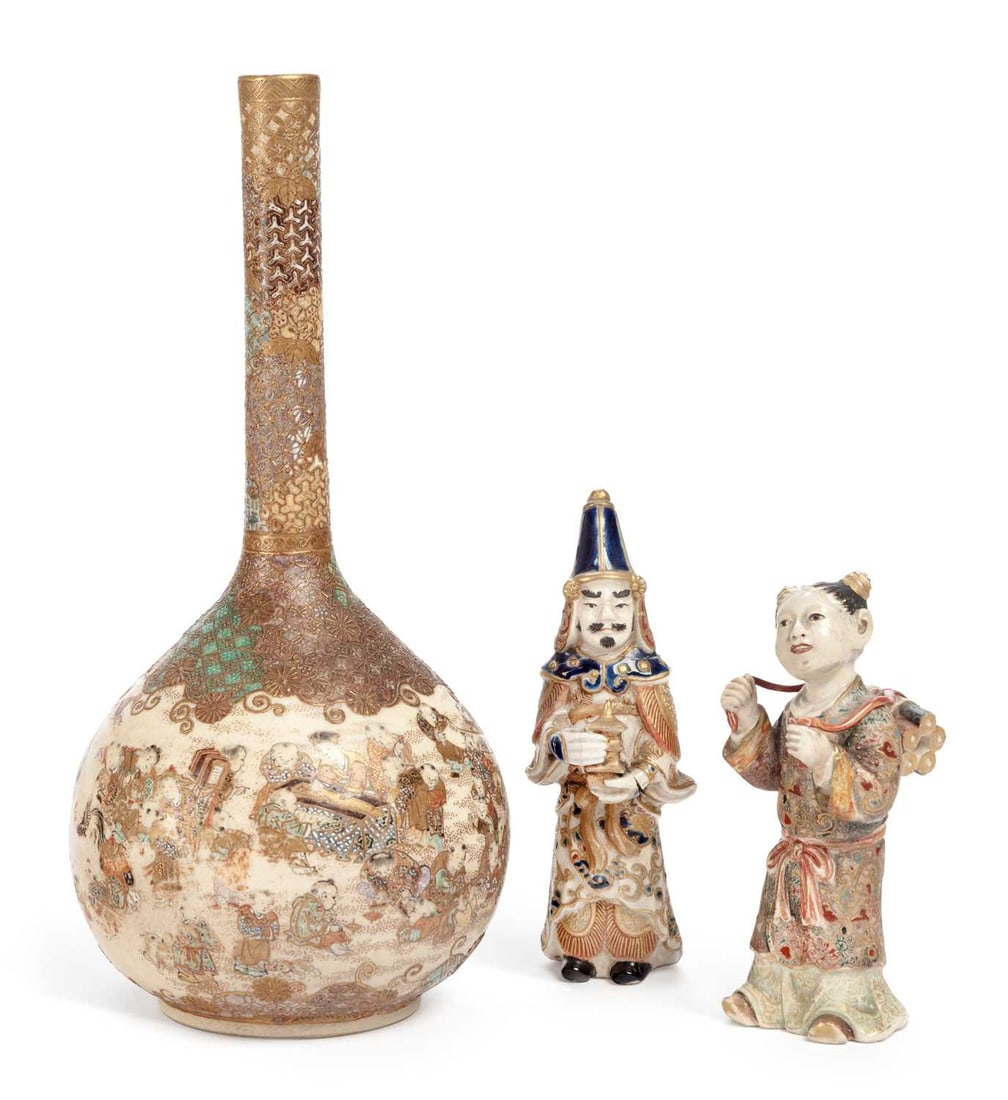 AN JAPANESE IMPERIAL SATSUMA FIGURE MEIJI PERIOD: the figure modelled as a Samurai, holding a miniature temple and decorated in typical enamels; along with a Satsuma figure of a boy carrying a bundle of scrolls; and a Satsuma vase, decorated with num
