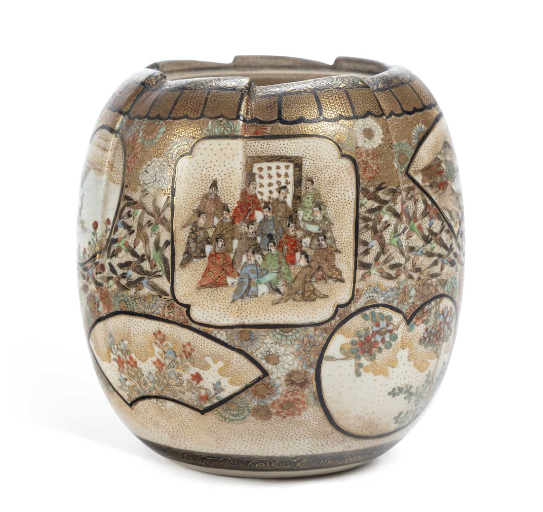 A JAPANESE SATSUMA JAR MEIJI PERIOD: of lobed form, finely painted and gilt with shaped panels of courtiers in a garden and a gathering of figures before a screen, with fan-shaped panels of a lakeside landscape and flowering branches, re