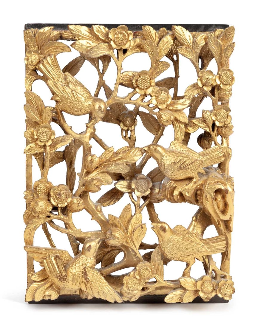 A CHINESE CARVED GILTWOOD PANEL CIRCA 1900: elaborately carved as birds amongst rocks and flowering peony, signed to the reverse. 24cm high