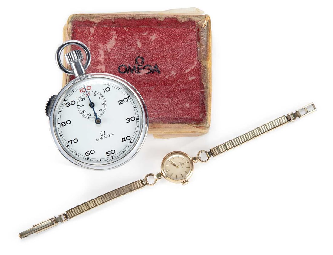 TWO OMEGA WATCHES: comprising a Lady's gold plated Omega watch with a silver dial and a manually wound movement; together with a 30 minute stop watch in a chromed case, in the original box. (2) Stopwatch case diameter