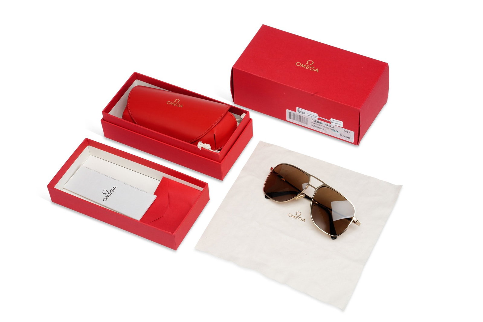 A PAIR OF OMEGA SUNGLASSES: gilt framed Aviator style sunglasses signed Omega on each arm, with a red carrying case, cloth sleeve and outer box all signed Omega. 15cm wide In unworn condition.
