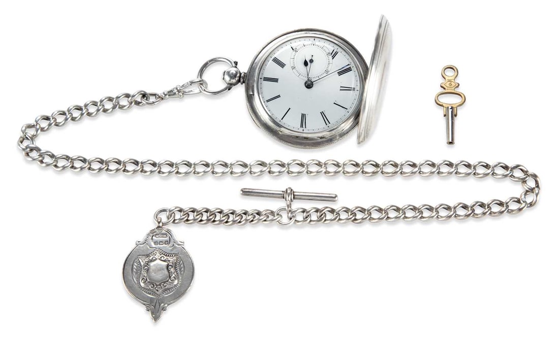 A SILVER FULL HUNTER POCKET WATCH AND ALBERT CHAIN: the circular white enamel dial with black Roman indices and outer minute track, sub-seconds dial at the 6 o'clock position, blued steel hands, hinged front cover with engine-turned decoration and cent