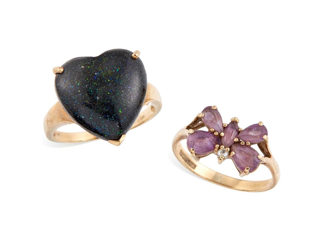 TWO 9 CARAT GOLD GEM-SET RINGS: comprising a heart-cut gemstone ring, hallmarked; and an amethyst butterfly ring, hallmarked. (2) Ring size N1/2 and L, 2.3 grams gross Good condition