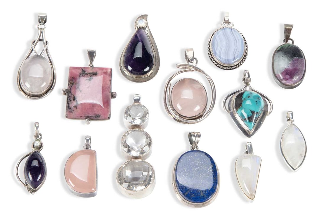 A COLLECTION OF SILVER GEM-SET PENDANTS: including ruby zoisite; rhodonite; rose quartz; moonstone; etc. (13) 7.5cm long and smaller, 240 grams gross Good condition
