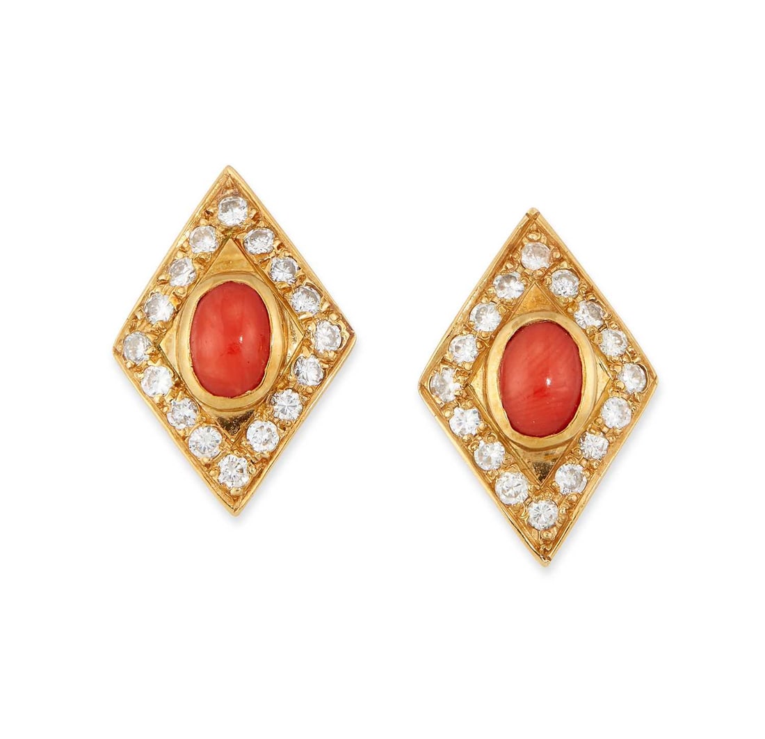 A PAIR OF CORAL AND DIAMOND STUD EARRINGS: oval coral within kite-shaped frames set with round brilliant-cut diamonds, with post fittings, unmarked. Estimated total diamond weight 0.65 carat, 2cm long, 5.9 grams Good condition. Estimated