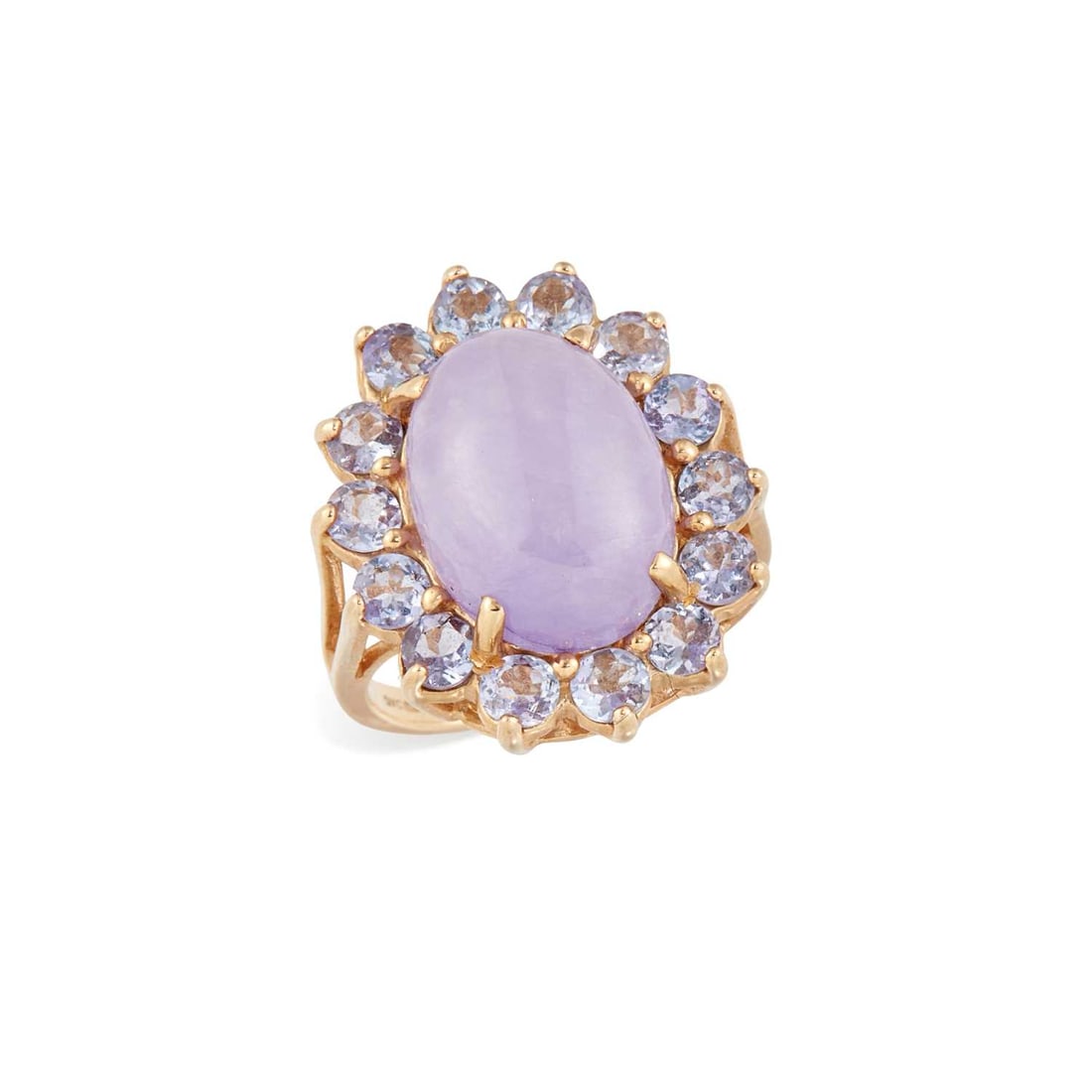 A 9 CARAT GOLD PURPLE JADE AND TANZANITE CLUSTER RING: an oval-cut jade within a border of round-cut tanzanite, hallmarked Birmingham 1999. Ring size K, 6.4 grams Good condition