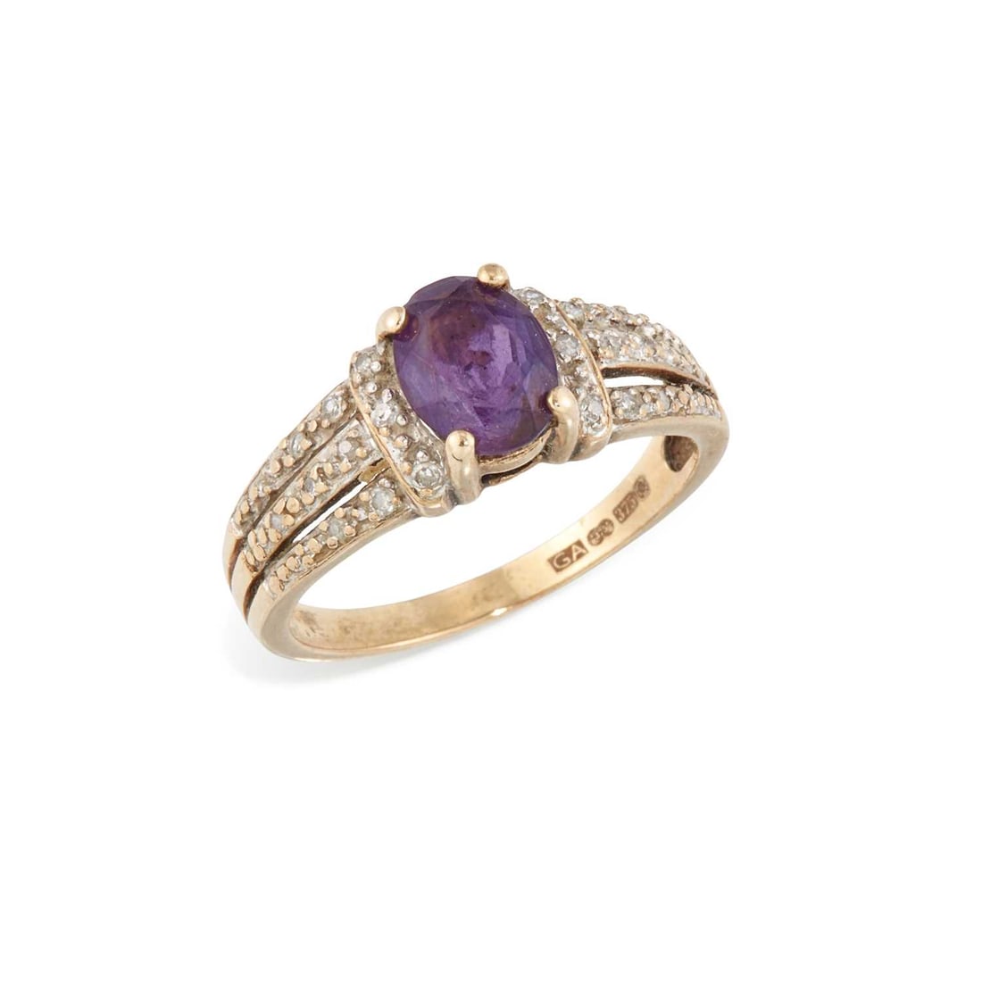 A 9 CARAT GOLD AMETHYST AND DIAMOND RING: an oval-cut amethyst to diamond-set shoulders, hallmarked Sheffield. Ring size P, 3.2 grams Good condition