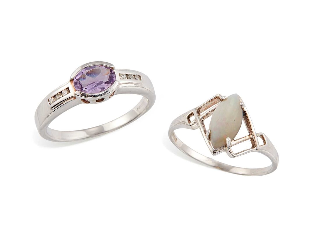 TWO 9 CARAT WHITE GOLD GEM-SET RINGS: comprising an opal ring, hallmarked; and an amethyst and diamond ring, hallmarked. (2) Ring size N1/2, 2.9 grams gross Good condition.