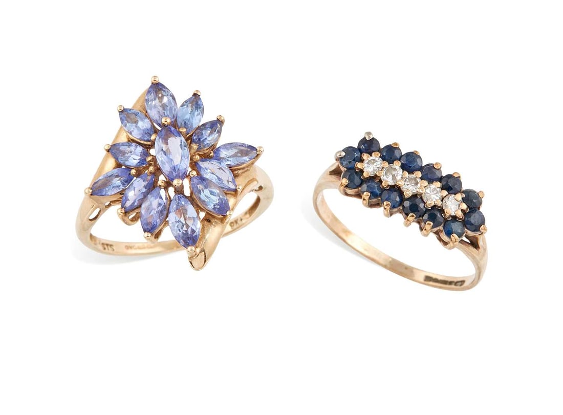 TWO 9 CARAT GOLD GEM-SET RINGS: comprising a tanzanite cluster ring, hallmarked; and a sapphire and diamond half hoop ring, hallmarked. (2) Ring size N1/2 and O, 3.2 grams gross Sapphire and diamond ring: band misshapen. Tanzanite