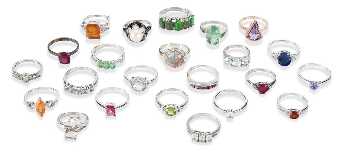 A COLLECTION OF SILVER GEM-SET RINGS: including ruby, fire opal, black diamond, etc. (23) Ring sizes T1/2 and smaller, 76 grams gross Good condition
