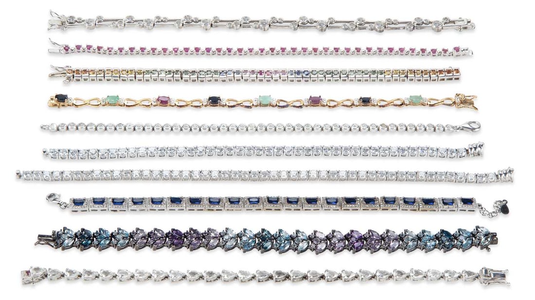 A GROUP OF SILVER GEM-SET BRACELETS: including cubic zirconia, ruby, etc. (10) 21.5cm long, 136 grams gross Good condition