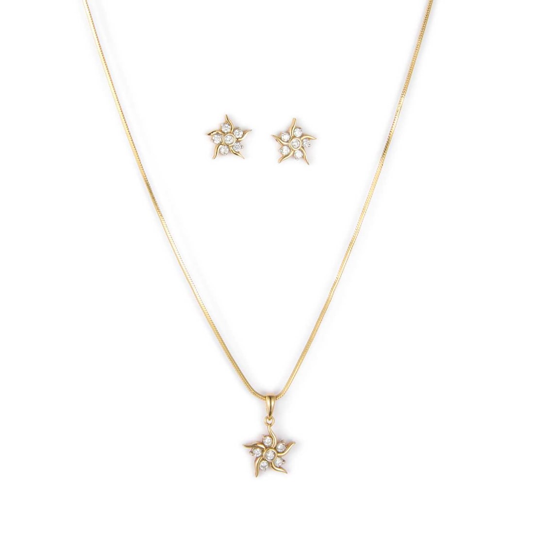 A DIAMOND CLUSTER PENDANT AND EARRING SET: round brilliant-cut diamonds in floral settings, pendant on a snake chain necklace, earrings with screw post fittings, stamped '18K'. (2) Estimated total diamond weight 0.35 carat, pendant 1.5cm
