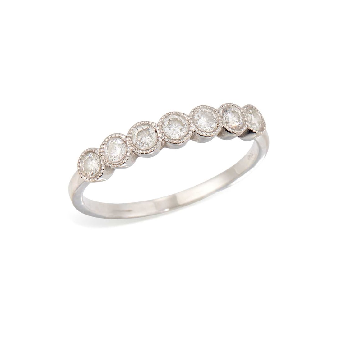 A DIAMOND HALF HOOP RING: seven round brilliant-cut diamonds in milgrain settings, stamped '750'. Estimated total diamond weight 0.70 carat, ring size S1/2, 2.4 grams Good condition. Estimated diamond colour: G/H, estimated