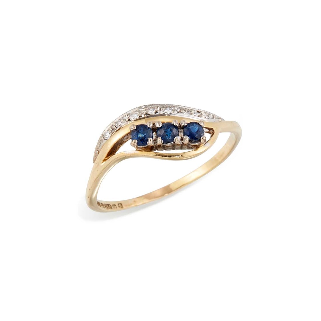 AN 18 CARAT GOLD SAPPHIRE AND DIAMOND RING: three round-cut sapphires to diamond-set bypass scroll shoulders, hallmarked Birmingham 1981. Ring size O1/2, 2.1 grams Shank slightly thin