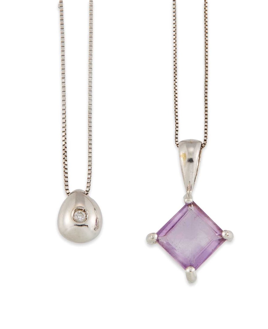 TWO WHITE GOLD GEM-SET PENDANT NECKLACES: comprising a 9 carat white gold amethyst pendant, on a fine chain; and a diamond pendant, stamped '585', on a fine chain. (2) Pendants 2cm long and smaller, first 2.3 grams, second 1.9 grams Good