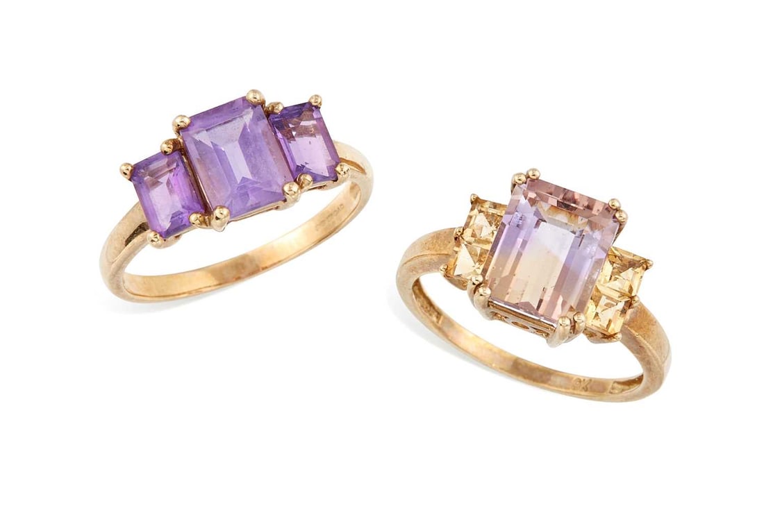 TWO 9 CARAT GOLD GEM-SET RINGS: comprising an ametrine and citrine ring, hallmarked; and an amethyst three stone ring, hallmarked. (2) Ring sizes P and Q, 3 grams gross Good condition.