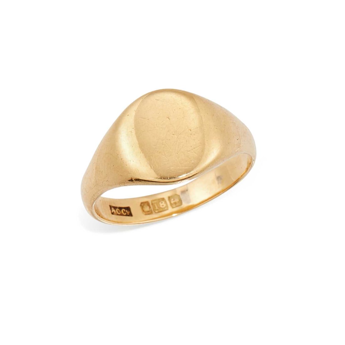 AN 18 CARAT GOLD SIGNET RING: hallmarked Birmingham. Ring size P, 6 grams Date letter worn. Light general wear