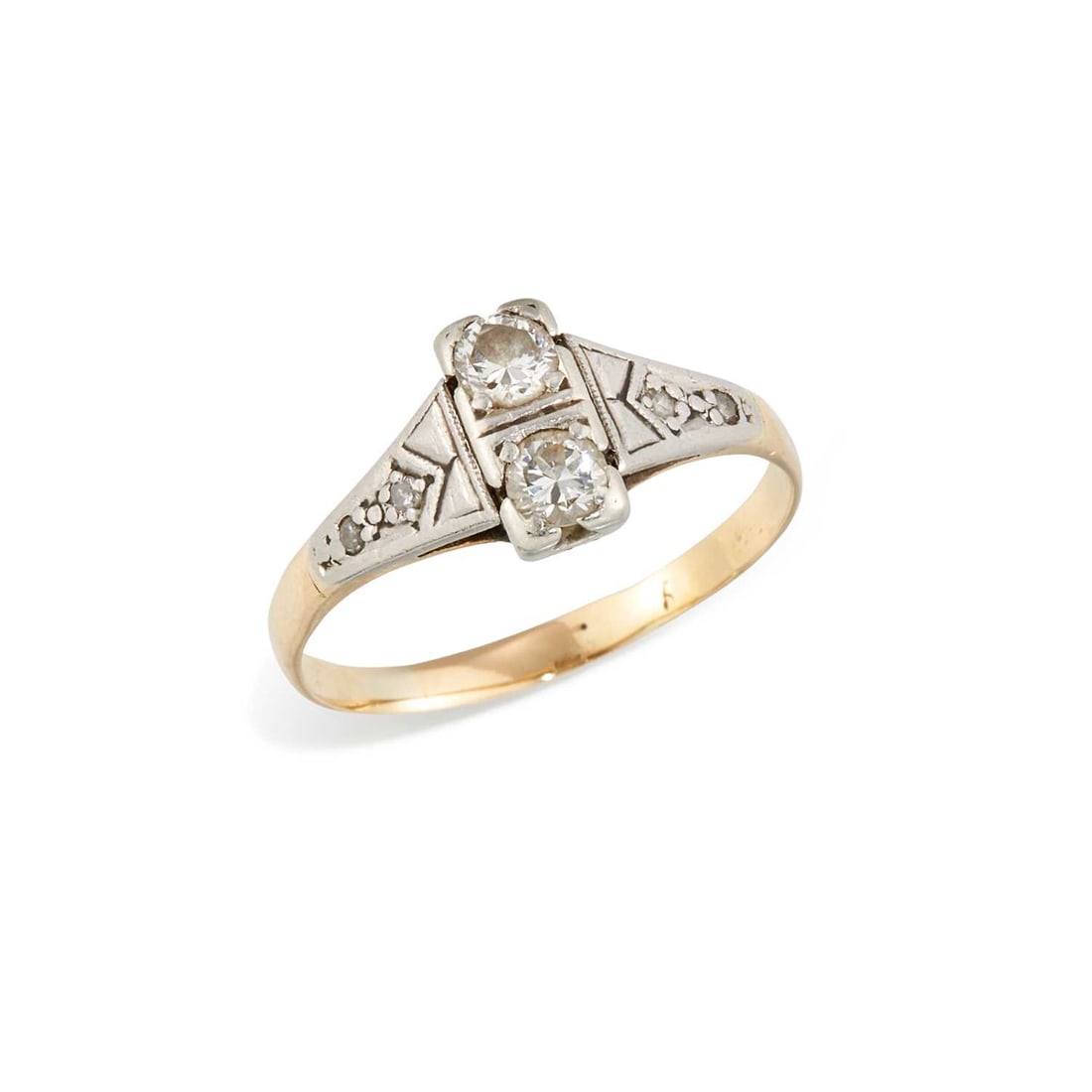 A DIAMOND RING: two round brilliant-cut diamonds to diamond-set tapering shoulders, unmarked. Estimated total diamond weight 0.20 carat, ring size O1/2, 2.6 grams Good condition. XRF tests as 18 carat gold.