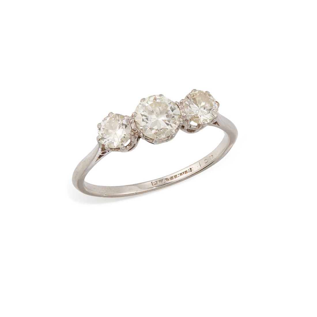 A DIAMOND THREE STONE RING: graduated round brilliant-cut diamonds in claw settings, stamped 'platinum'. Estimated total diamond weight 1.10 carat, ring size Q1/2, 3.1 grams Band slightly worn and thin. Estimated diamond colour: