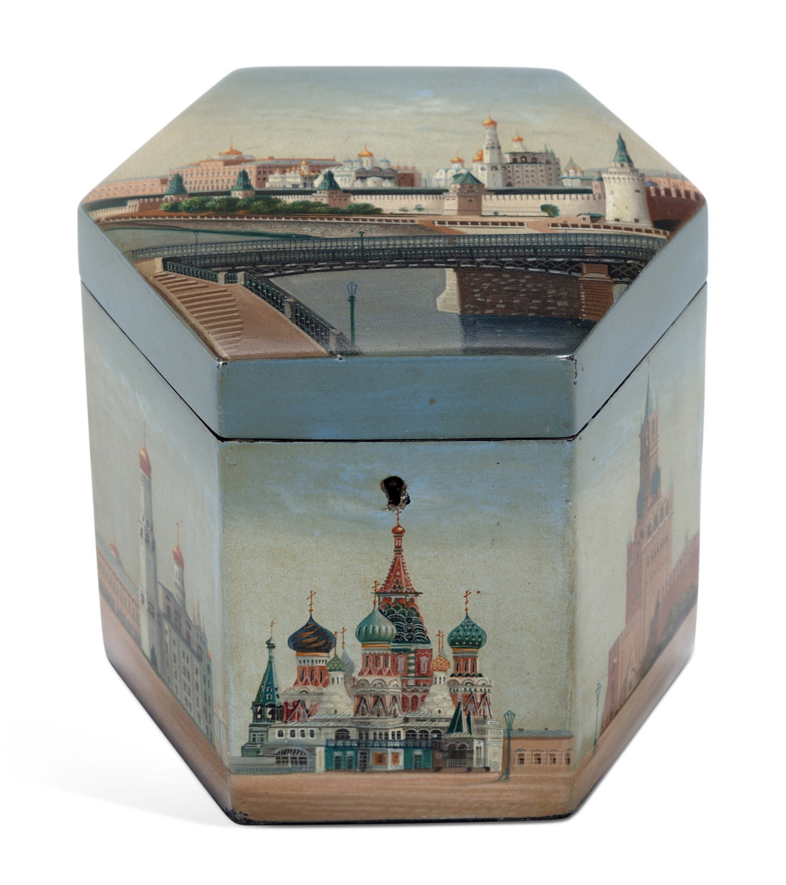 A RUSSIAN LACQUERED TEA CADDY CIRCA 1890: hexagonal form, well painted with historic Moscow landmarks. 12.5cm high