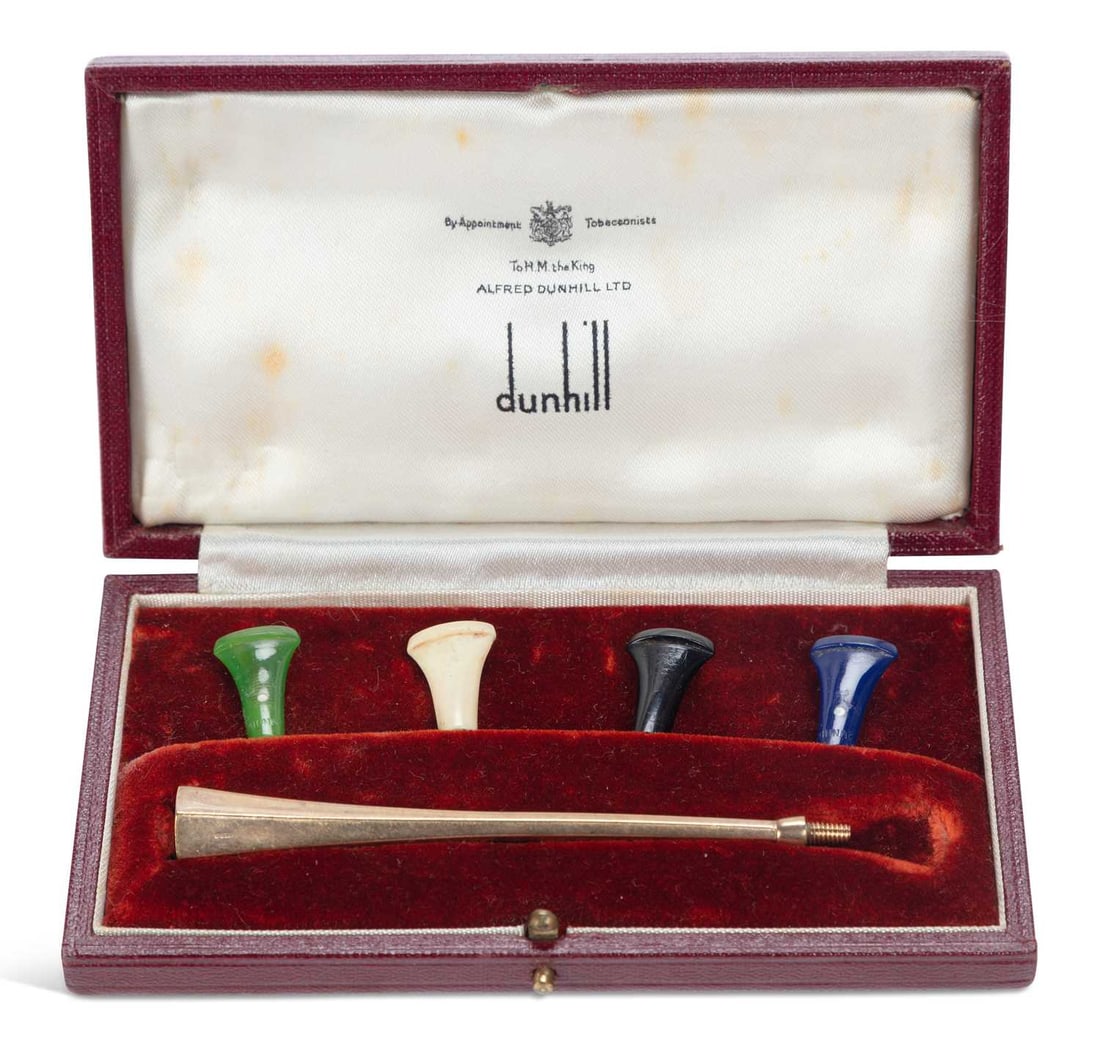 ALFRED DUNHILL, A 9CT GOLD CASED CIGARETTE HOLDER (1 of 1)