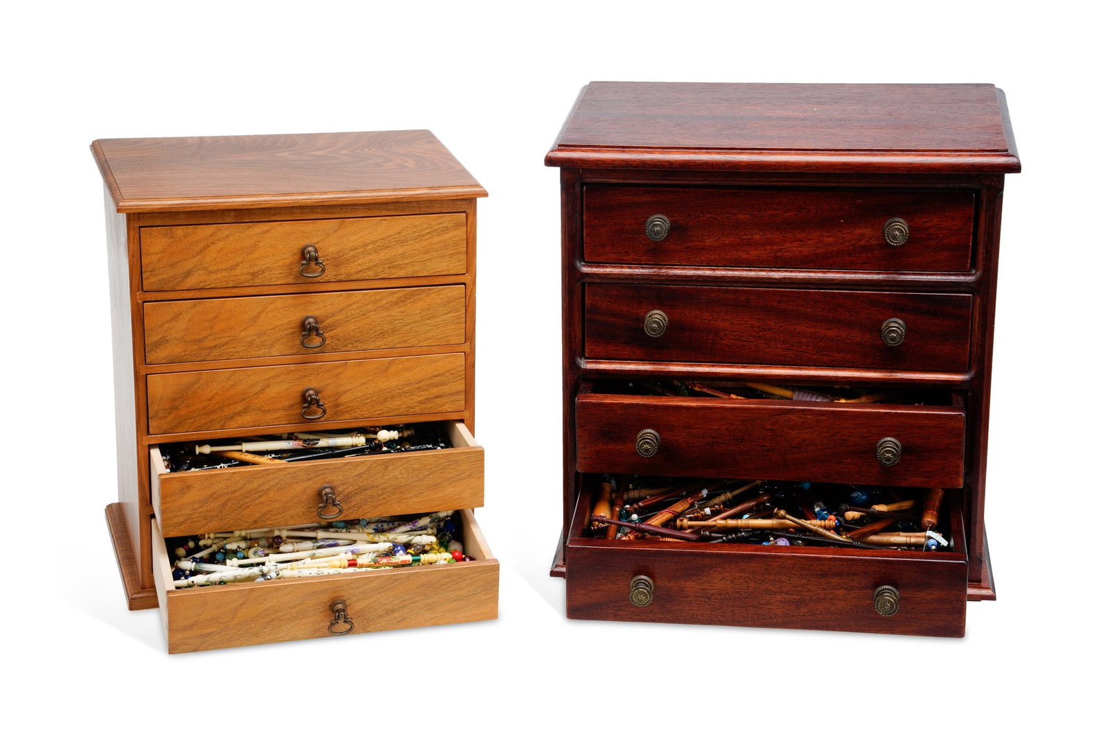 A LARGE COLLECTION OF LACE BOBBINS: in bone and various woods including ebony, the majority with glass bead spangles, many painted, incised or inscribed and including commemorative examples for Charlotte Bronte, The Lacemakers of