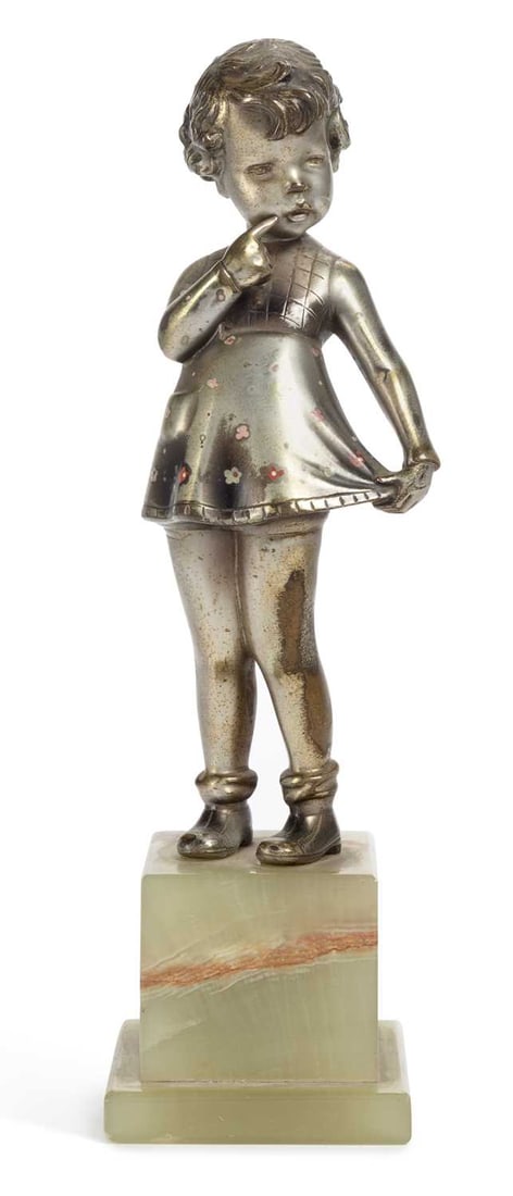 AFTER FERDINAND PREISS, AN ART DECO BRONZE FIGURE OF A GIRL CIRCA 1930: the silvered bronze figure with enamelled floral decoration in the manner of Crejo, set upon a stepped onyx base. 21.5cm high