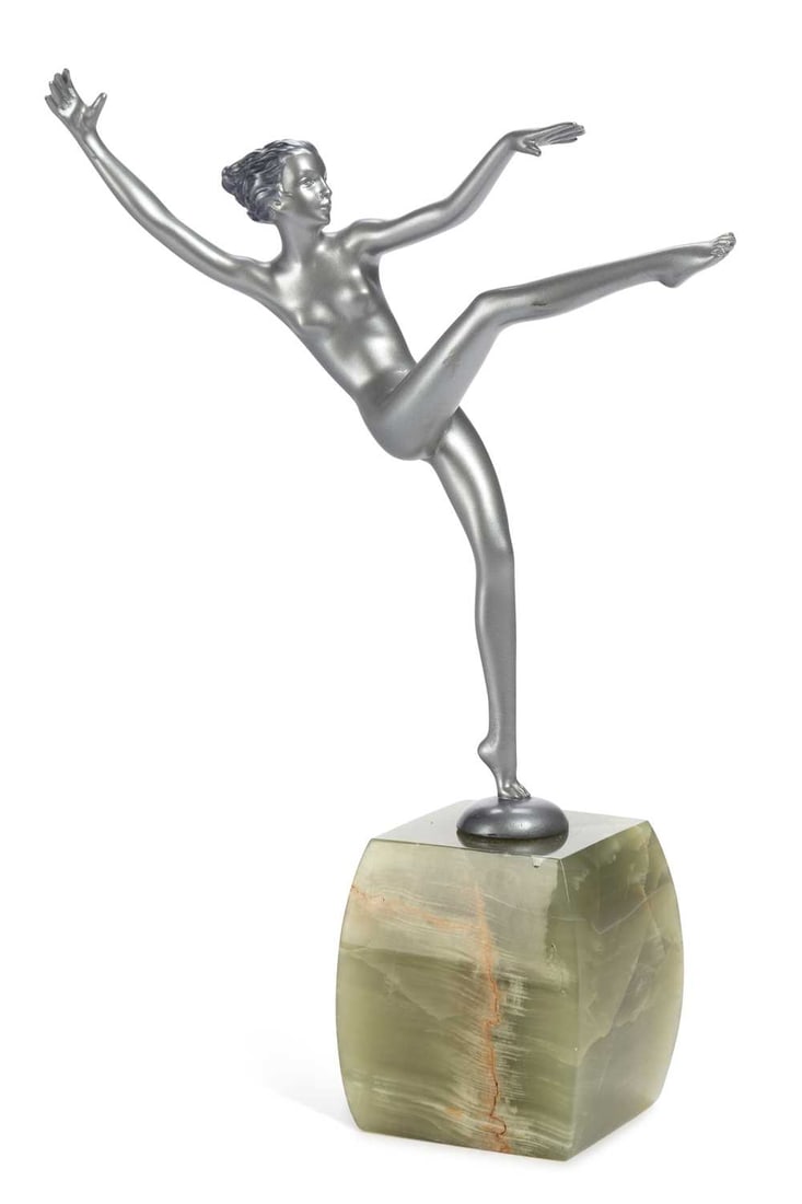 JOSEF LORENZL, A BRONZE FIGURE OF A DANCER CIRCA 1930: the cold painted bronze figure cast as a young naked girl dancing, set upon an onyx base, signed Lorenzl. 25cm high