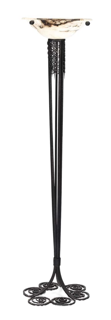 AN ART DECO WROUGHT IRON STANDARD LAMP WITH ALABASTER COUPE: the circular alabaster coupe raised on an openwork tapering stem issuing from a scroll-form base. 181cm high Few scratches to the surface but no cracks or repairs or signs of damage