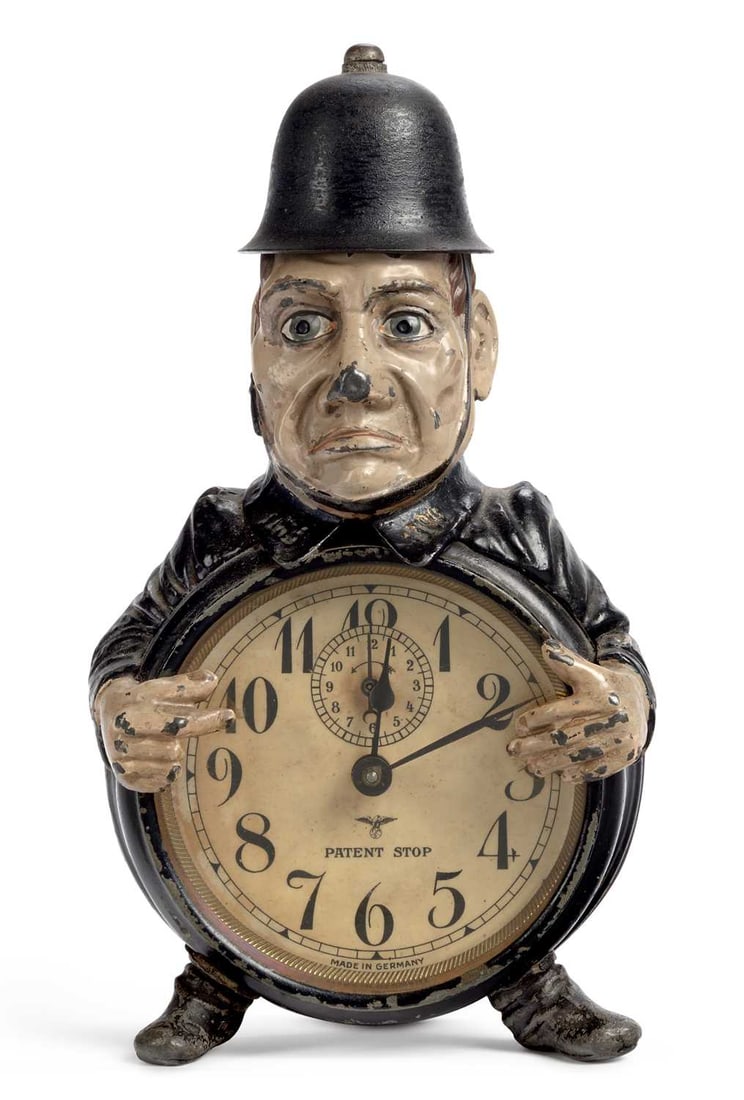 A F.M.S. NOVELTY POLICEMAN ALARM CLOCK CIRCA 1925 (1 of 3)