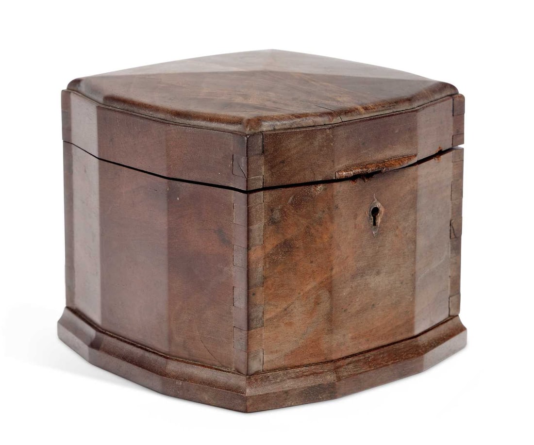 HUGH BIRKETT (BRITISH, 1919-2002) A WALNUT JEWELLERY BOX, 1948: of bowed square form with exposed dovetail joints, the hinged cover opening to reveal a fitted green baize-lined lift-out tray, incised 19 . H B . 48 to the underside. 11cm high surface scratches and 