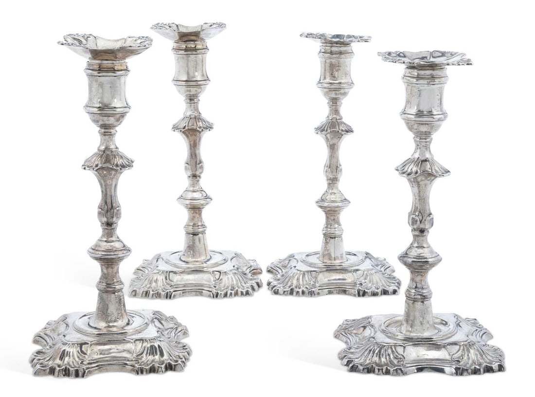 A SET OF FOUR GEORGE II SILVER CANDLESTICKS (1 of 3)