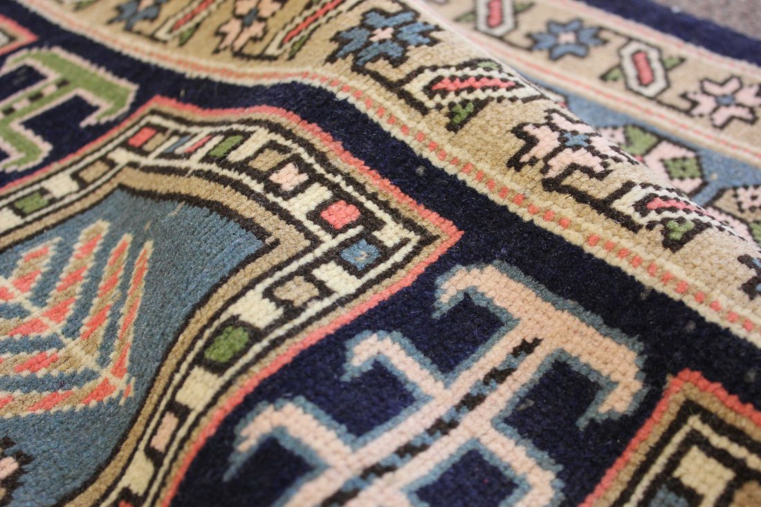 RARE ANTIQUE SHIRVAN 3'11" x 6'4", 122 x 192 CM: Hand-knotted by skilled artisan weavers in Shirvan on the shores of the Caspian Sea in the mid-twentieth century. This antiques 100% wool rug is adorned with decorative elements of geometric field des