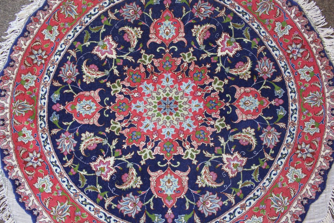 VINTAGE ROUND RUG,TABRIZ, 3'4" x 3'4", 101 x 101 CM: Region: Persia. Workshop: unknown. Knot Density (sq inches): 360. Weave: hand-knotted. Warp (foundation): cotton. Pile: virgin wool & pure silk. Floral design, multi colours. Production time: 3 months