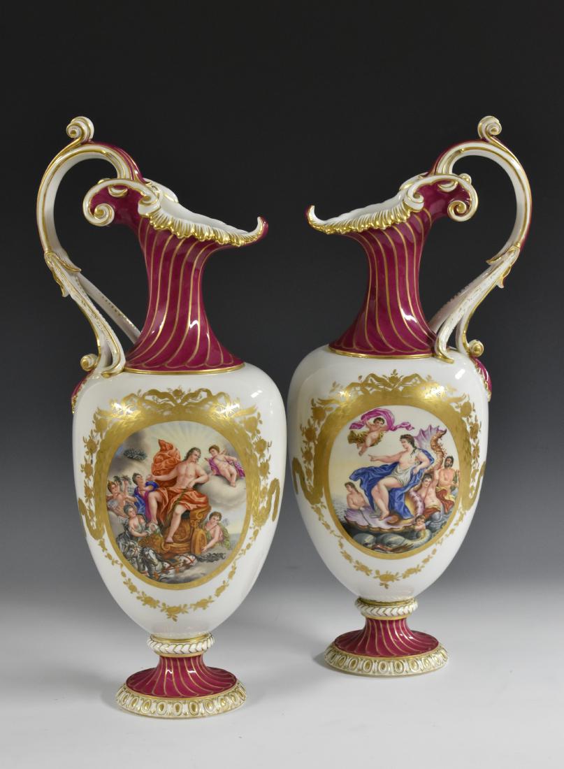 A pair of Berlin pedestal ewers, decorated with (1 of 1)