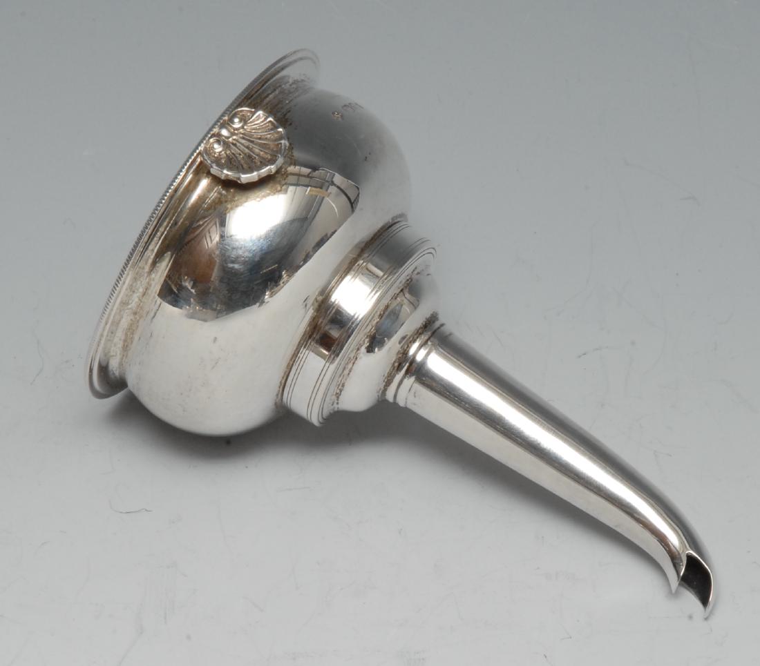 Asprey & Co - a George III style wine funnel, milled: Asprey & Co - a George III style wine funnel, milled border, shell rest, 11.5cm long, London 1978
