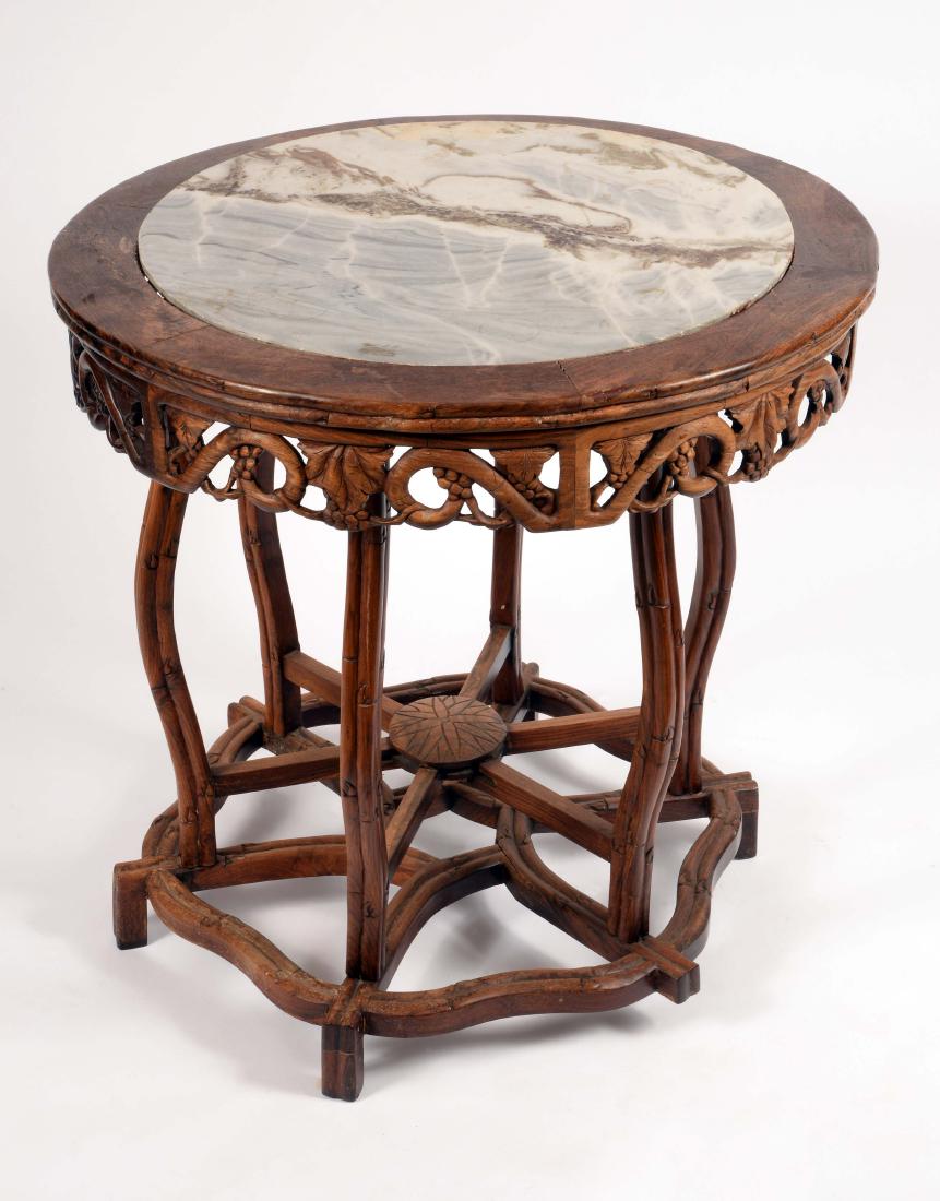 A Chinese hardwood circular centre table, dreamstone (1 of 1)