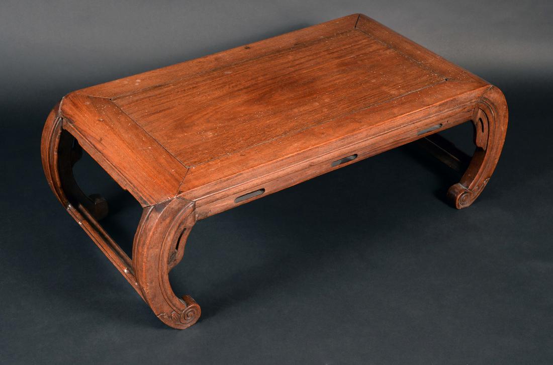 A Chinese hardwood low tea table, panel top above a (1 of 1)
