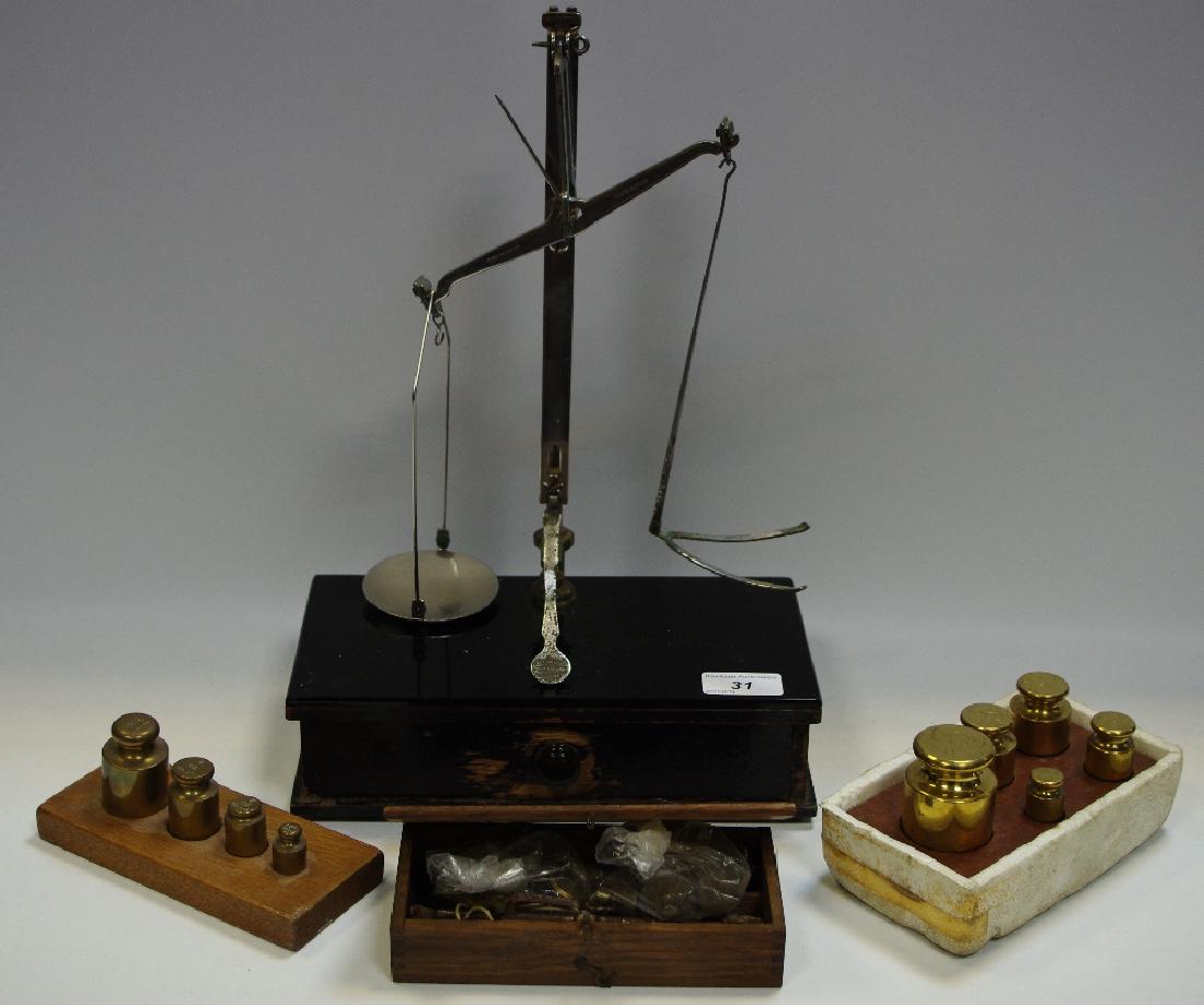 A set of W & T Avery apothecary scales mounted on (1 of 1)